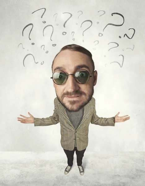 Big head person with question marks — Stock Photo, Image