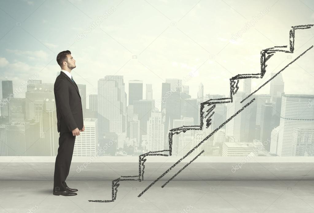 Business man climbing up on hand drawn staircase concept