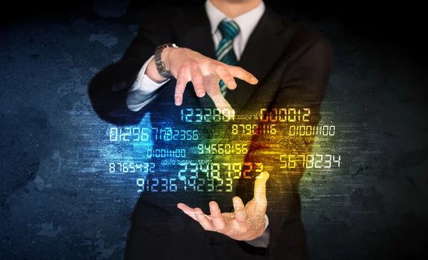 Businessman holding number cloud — Stock Photo, Image