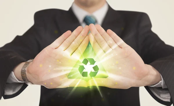 Hands creating a form with recycling sign — Stock Photo, Image