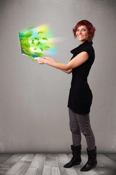 Casual woman holding notebook with recycle and environmental sym — Stock Photo, Image