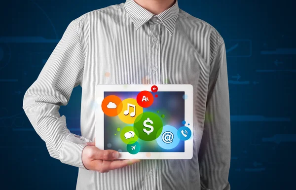 Businessman presenting colorful modern signs — Stock Photo, Image