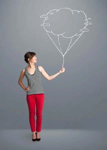 Bonita senhora segurando um desenho de balão nuvem — Fotografia de Stock