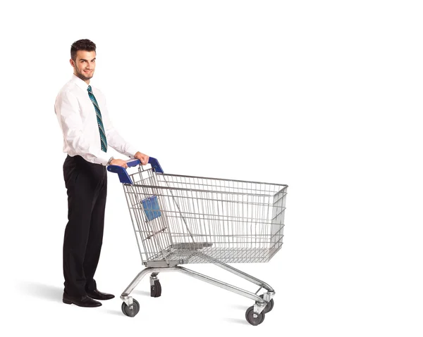 Uomo d'affari con carrello della spesa — Foto Stock