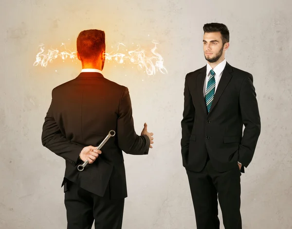 Angry businessman with weapon — Stock Photo, Image