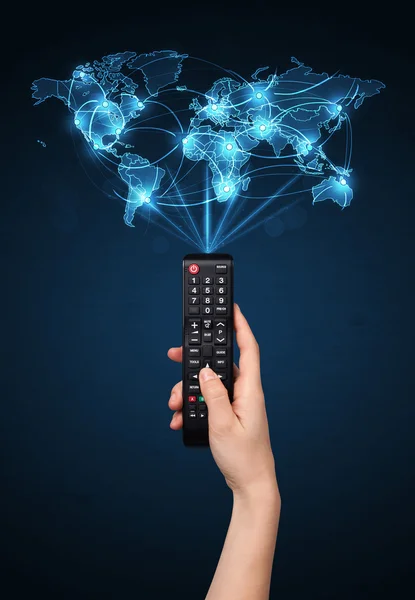 Hand with remote control, social media concept — Stock Photo, Image