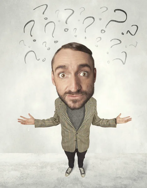 Big head person with question marks — Stock Photo, Image