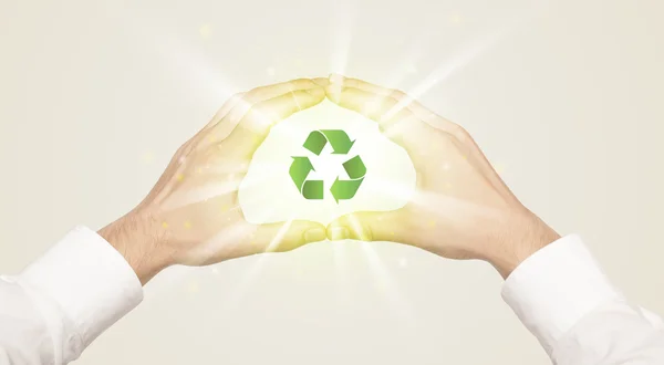 Hands creating a form with recycling sign — Stock Photo, Image