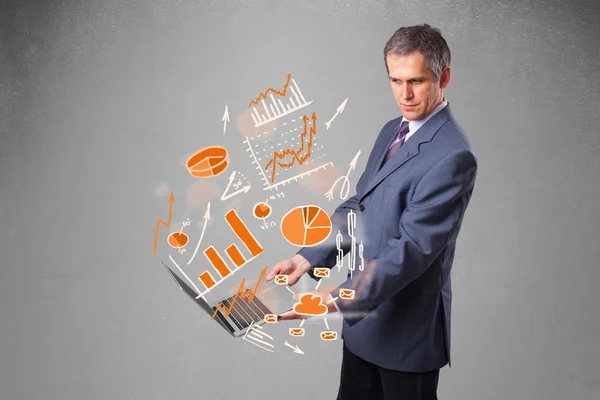 Businessman holding notebook with graphs and statistics — Stock Photo, Image