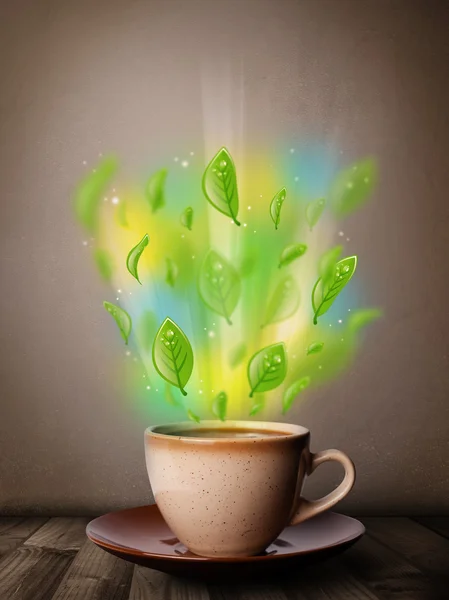Herbata filiżanka z liści i kolorowe abstrakcyjne światła — Zdjęcie stockowe