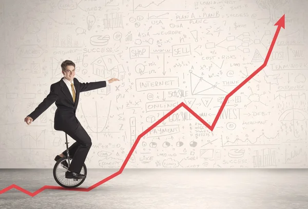 Business parson riding unicycle on an uprising red arrow — Stock Photo, Image