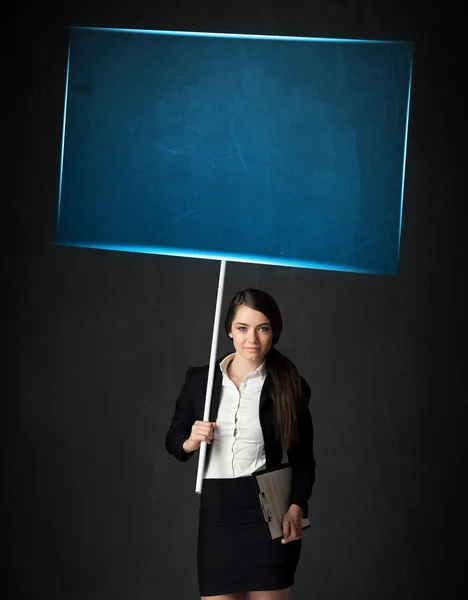 Businesswoman with blue board — Stock Photo, Image