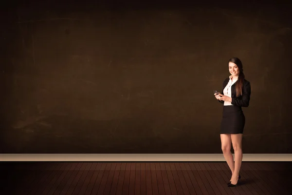 Businesswoman holding high tech tablet on background with copysp — Stock Photo, Image