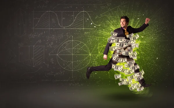Cheerful businesman jumping with dollar banknotes around him — Stock Photo, Image