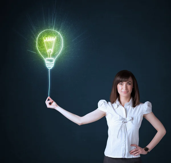Geschäftsfrau mit einer Ideenlampe — Stockfoto
