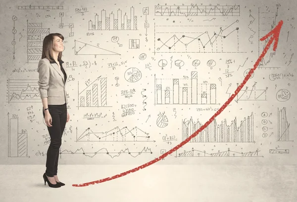 Zakelijke vrouw klimmen op rode grafiek pijl concept — Stockfoto
