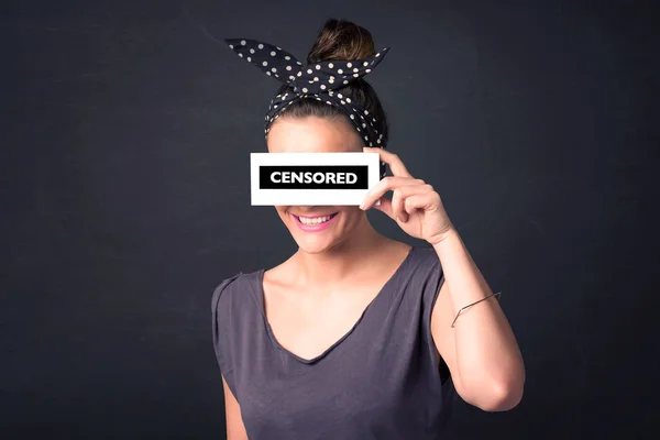 Pretty girl with censored paper sign — Stock Photo, Image