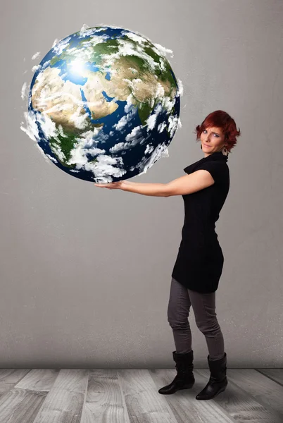 Pretty girl holding 3d planet earth — Stock Photo, Image