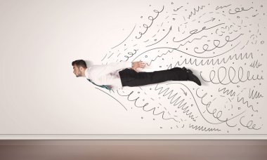 Elle çizilmiş çizgilerle uçan bir iş adamı geliyor. 