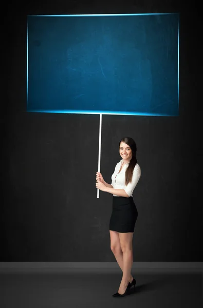 Zakenvrouw met blauw bord — Stockfoto