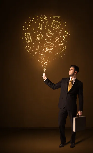 Businessman with a social media balloon — Stock Photo, Image