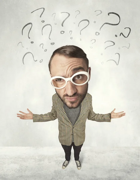 Big head person with question marks — Stock Photo, Image