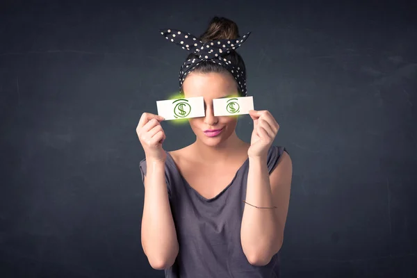 Young girl holding paper with green dollar sign — Stock Photo, Image