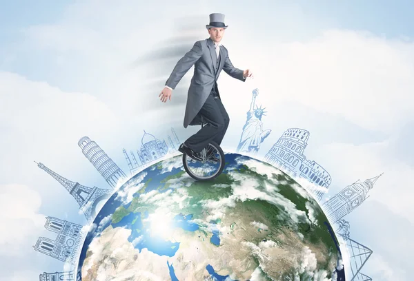 Man rijden eenwieler over de hele wereld met grote steden — Stockfoto