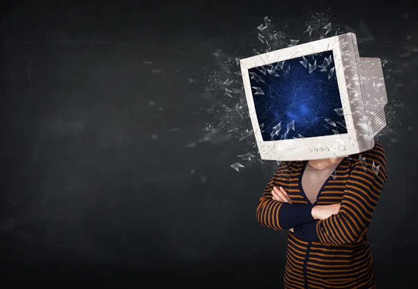 Computer monitor screen exploding on a young persons head — Stock Photo, Image