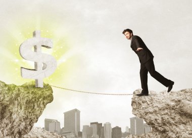Bir dolar işareti ile rock dağda işadamı