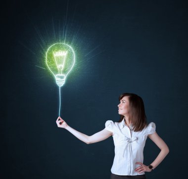 Bir fikir ampulü olan iş kadını.