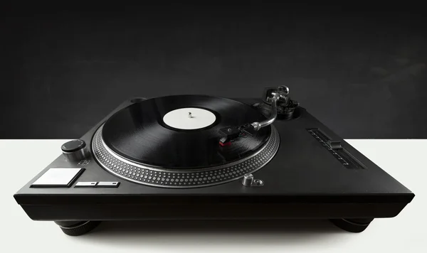 Turntable playing vinyl close up with needle on the record — Stock Photo, Image