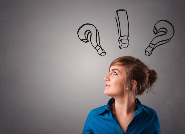 Young lady thinking with question marks overhead — Stock Photo, Image