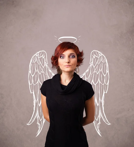 Cute girl with angel illustrated wings — Stock Photo, Image