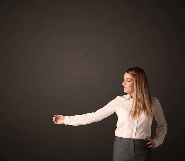 Businesswoman making gestures — Stock Photo, Image