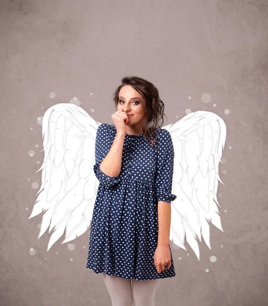 Person with angel illustrated wings on grungy background — Stock Photo, Image