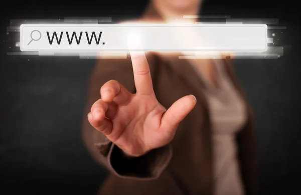 Young businesswoman touching web browser address bar with www si — Stock Photo, Image