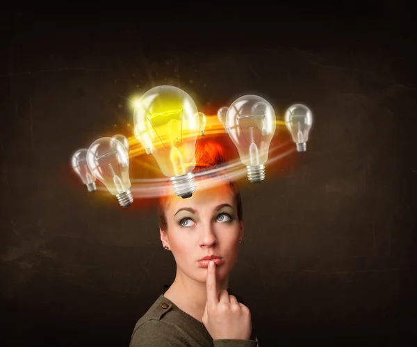 Woman with light bulbs circleing around her head — Stock Photo, Image