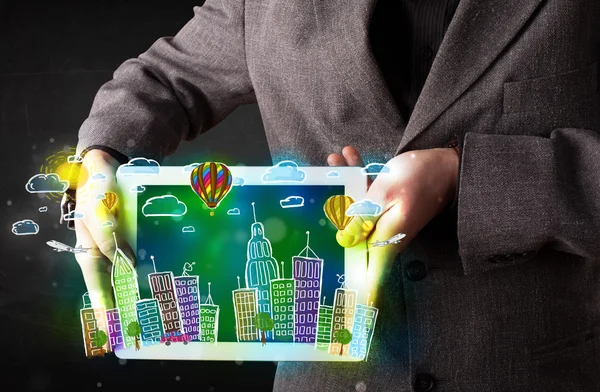 Young person showing tablet with hand drawn cityscape — Stock Photo, Image