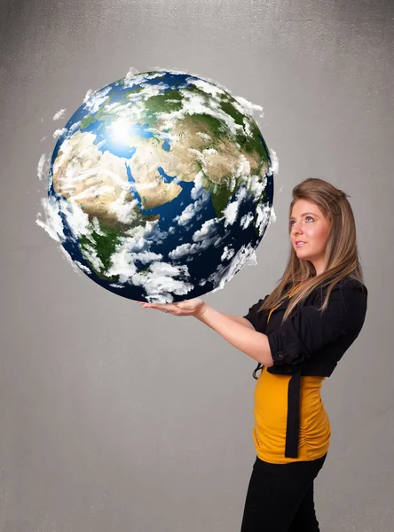 Menina bonita segurando 3d planeta terra — Fotografia de Stock