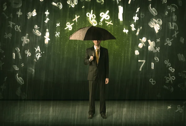 Businessman standing with umbrella and 3d numbers raining concep — Stock Photo, Image