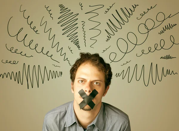 Young man with glued mouth and curly lines — Stock Photo, Image