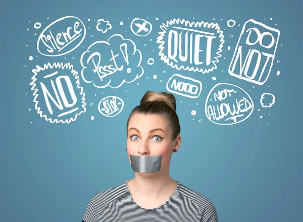 Young woman with glued mouth and thought clouds — Stock Photo, Image