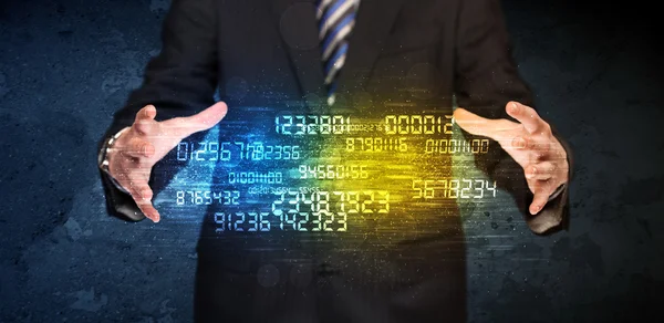 Businessman holding number cloud — Stock Photo, Image