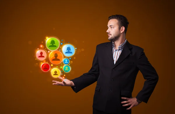 Social network icons in the hand of a businessman — Stock Photo, Image