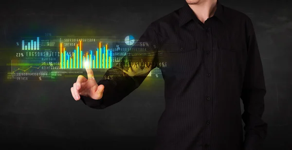 Joven persona de negocios tocando gráficos y diagramas coloridos —  Fotos de Stock