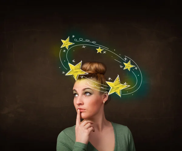 Girl with yellow stars circleing around her head illustration — Stock Photo, Image