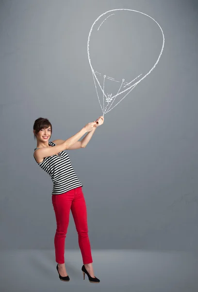 Mooie vrouw met ballon tekening — Stockfoto