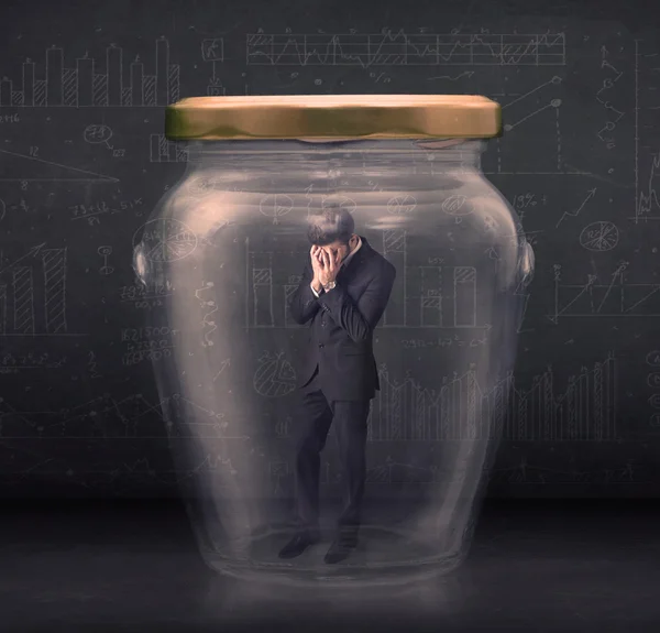 Business man closed into a glass jar concept — Stock Photo, Image