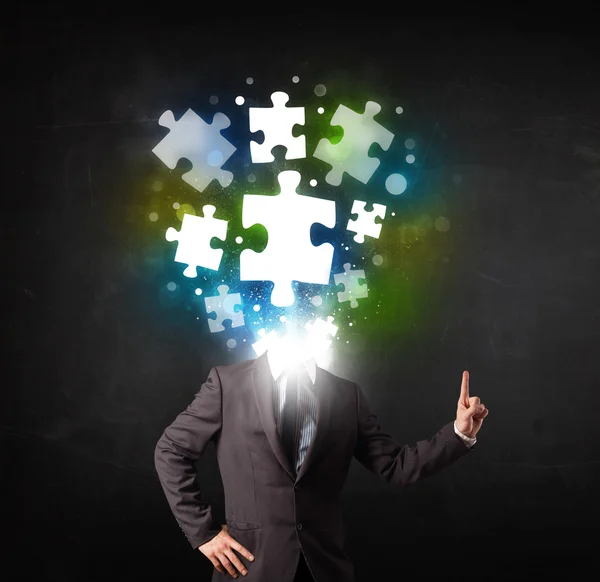 Character in suit with puzzle head concept — Stock Photo, Image